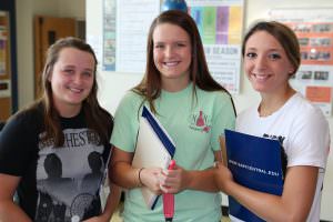 Students smiling for camera during orientation